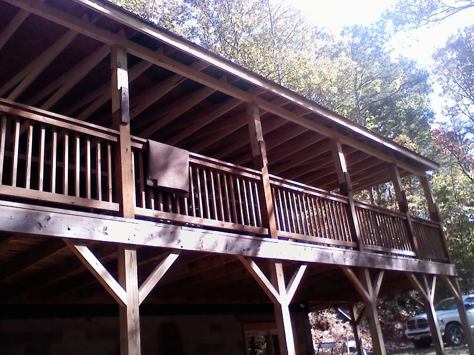 Timber framing under a new elevated porch and deck — Roof Leak Repair in Scottville by Roofing Brothers